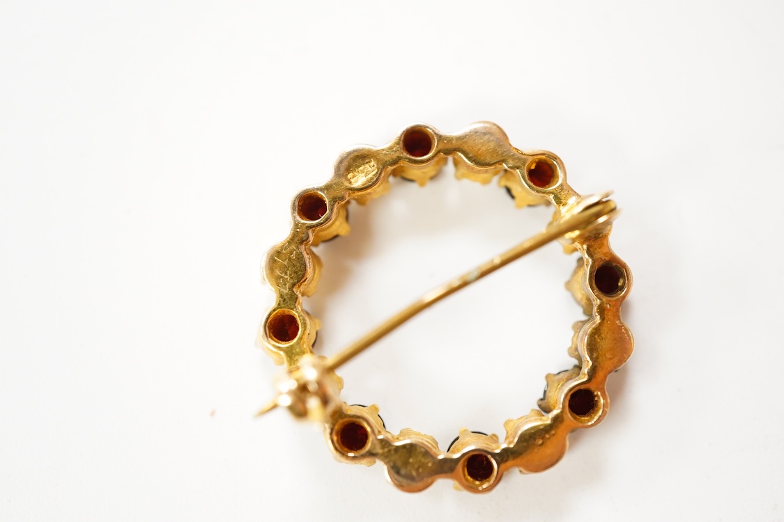 A Victorian 15ct and diamond set navette shaped Etruscan style brooch (lacking pin), 46mm, gross weight 3.5 grams, a 9ct, amethyst and seed pearl set bar brooch and a 9ct, garnet and split pearl set wreath brooch, gross